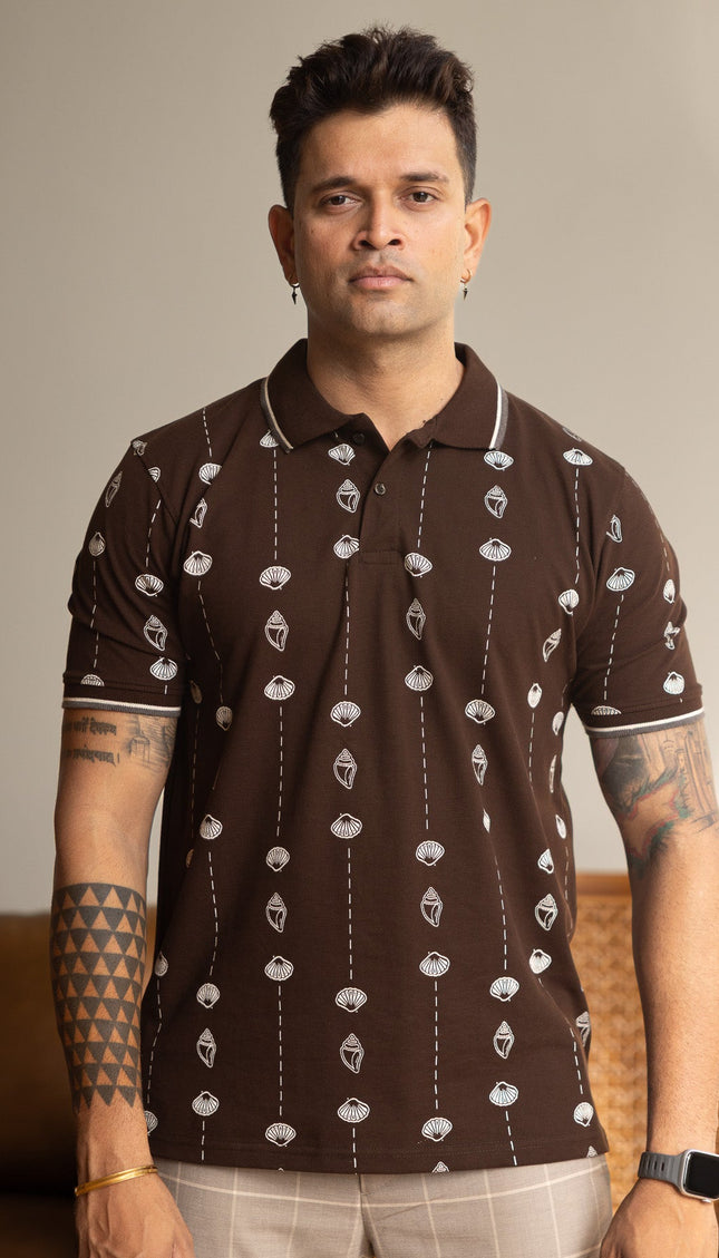 Person wearing brown t-shirt with heritage print