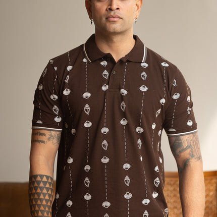 Person wearing brown t-shirt with heritage print