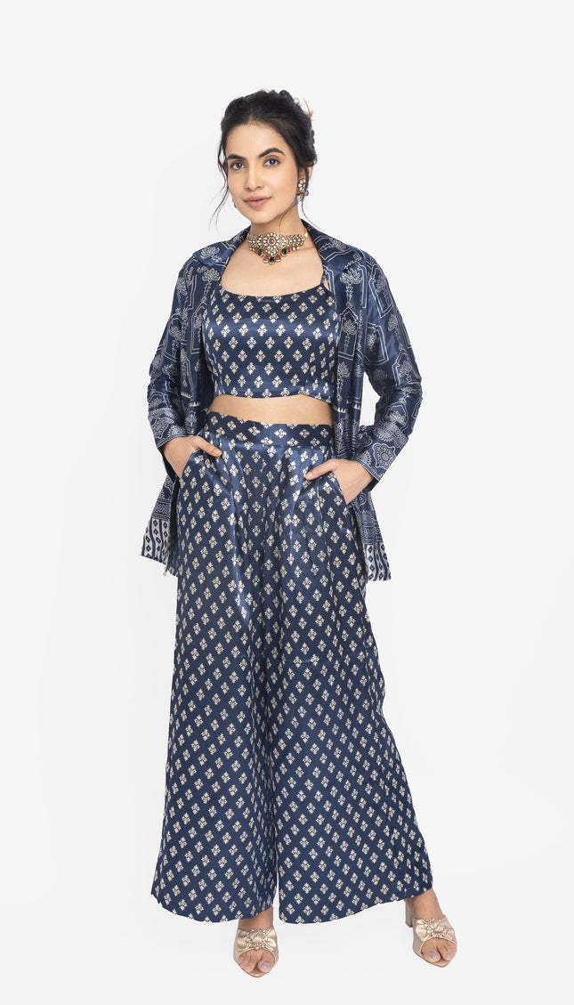 Woman wearing a navy blue patterned outfit