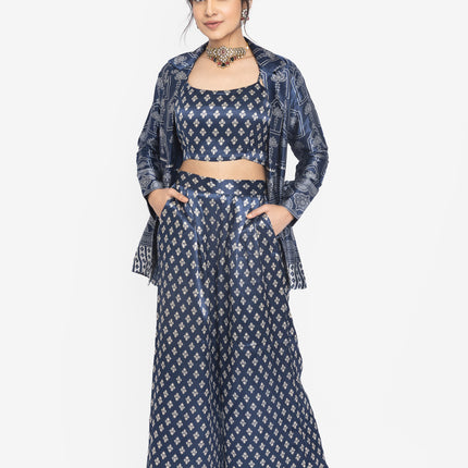 Woman wearing a navy blue patterned outfit