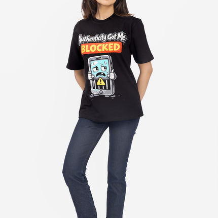 Person wearing a black t-shirt with a graphic design and text 