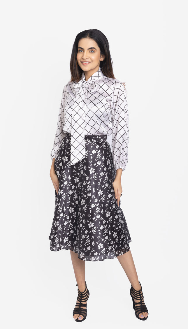 White checkered shirt with black floral skirt women’s outfit by RREFLEKT