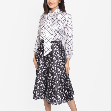 White checkered shirt with black floral skirt women’s outfit by RREFLEKT